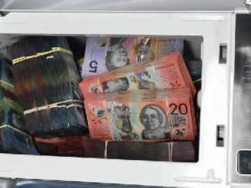 Baldivis Man Charged After AFP Seize Haul Of Cigarettes, Vapes, $2.6M Cash